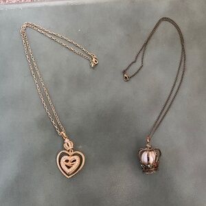 Two gold and bronze heart/crown necklaces, gold with clear stones, colored stone